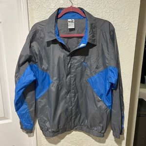 Puma mens size medium blue and gray windbreaker.